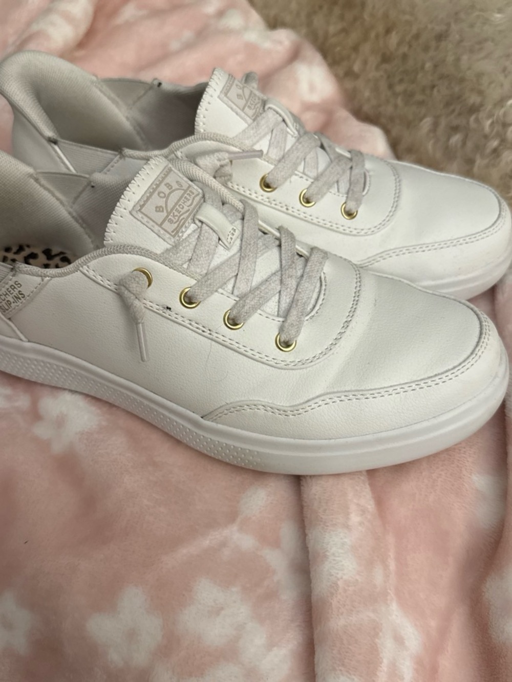 Skechers White Women's Slip On Leather Sneakers with Gold Eyelets